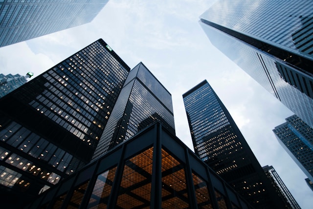 Business professionals in meeting analyzing financial growth